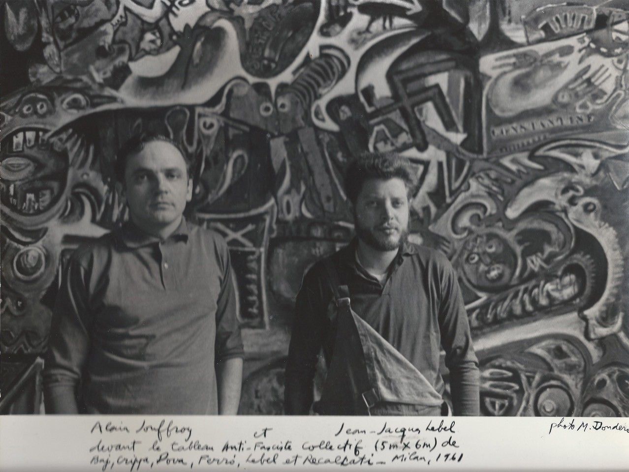 alain-jouffroy-et-jean-jacques-lebel-devant-le-grand-tableau-collectif-anti-fasciste.-milan-1961.jpg